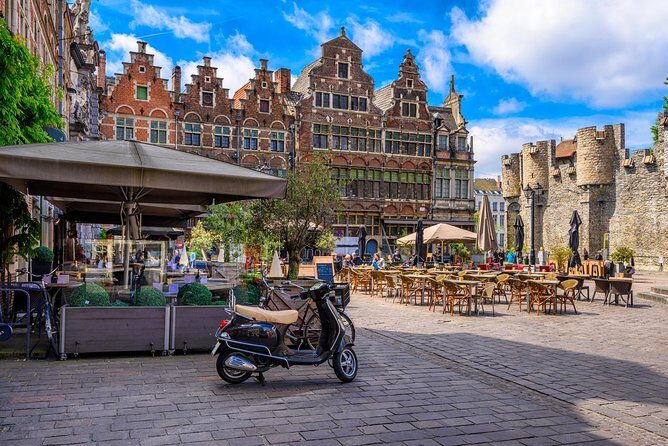 Antwerp and Ghent Day Trip from Brussels With Atomium Photo Stop - Coach Comfort, Group Size, and How Guides Shape the Day