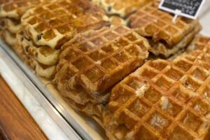 Brussels Food Tour: 10 Tastings of Waffles, Beers, Fries & More - Stop 2 through Stop 4: Grand Place legends, Ommegang vibes, and Saint Hubert’s glass-and-stone charm