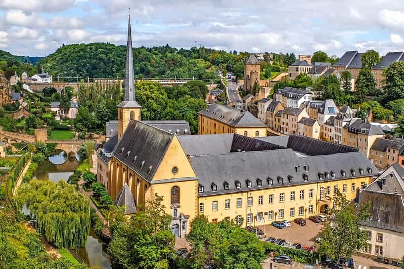 From Brussels: Guided Day Trip to Dinant and Luxembourg - The Collegiate Church, Sax, and Leffe: how to spend your Dinant time well